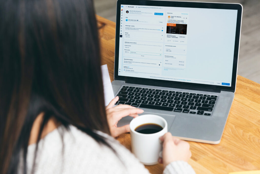 macbook pro mockup v5 business woman 2 There's more to Meta (Facebook) ads than the Boost button.